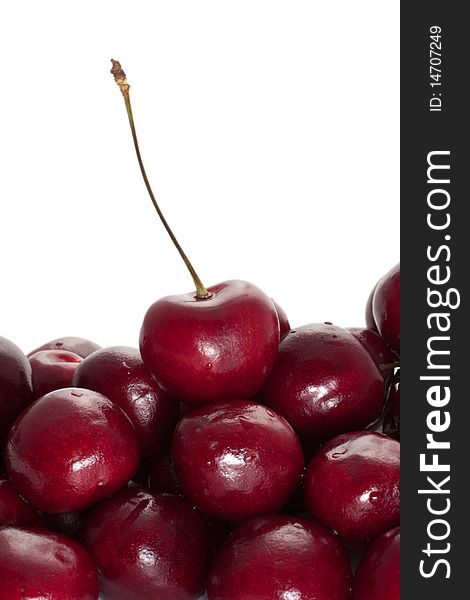 Group cherry with water droplets on a white background (selective focus)