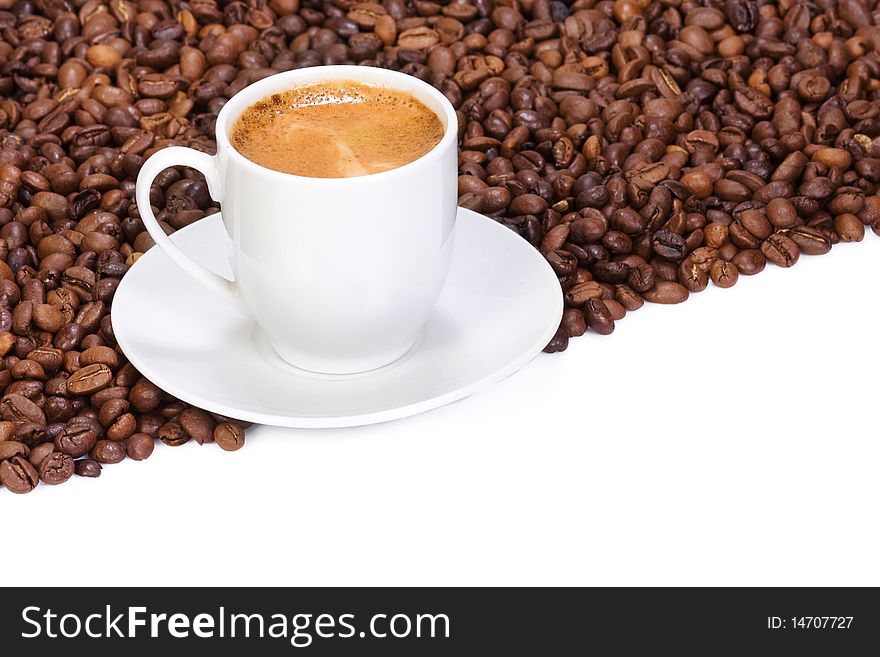 Isolated coffee and beans on white