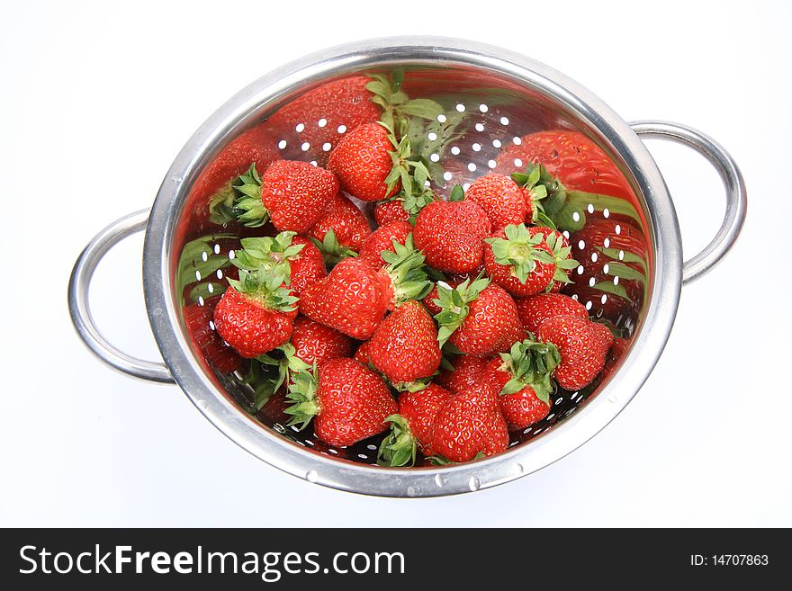 Washed strawberries in a colander