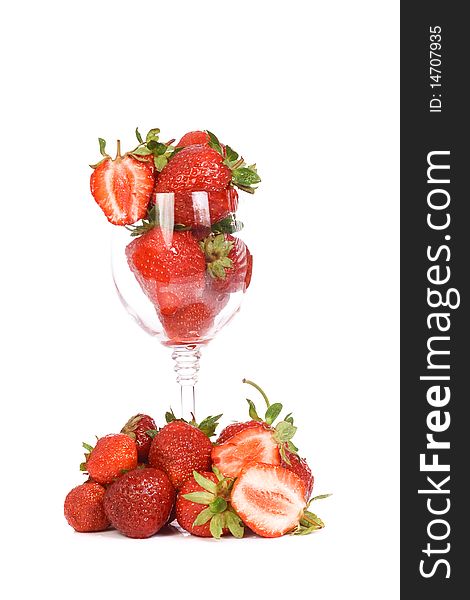 Glass full of strawberry on white background