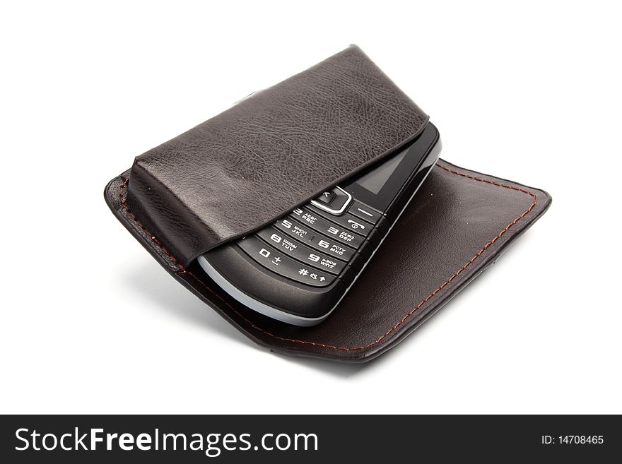 Cell phone in leather case isolated on white. Cell phone in leather case isolated on white