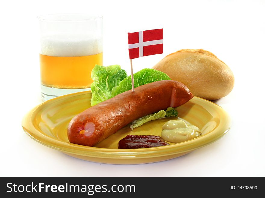 Danish sausage with bread on a plate