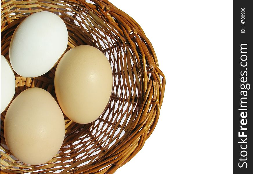 Top view of eggs in an basket on white background. Top view of eggs in an basket on white background