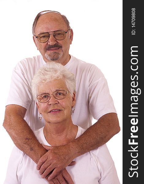 Happy senior couple in loving portrait.