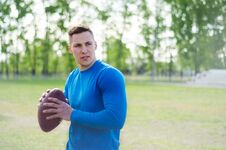 Free Portrait Of A Young American Football Player With A Ball In Training Royalty Free Stock Photo - 147079965
