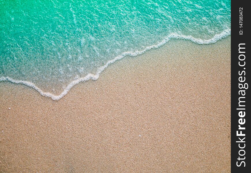 Soft wave on sandy beach. Background summer concept background