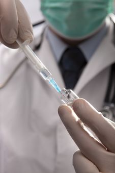 Doctor With Medical Syringe In Hands Royalty Free Stock Photo Doctor With Medical Syringe In Hands Royalty Free Stock Photo
