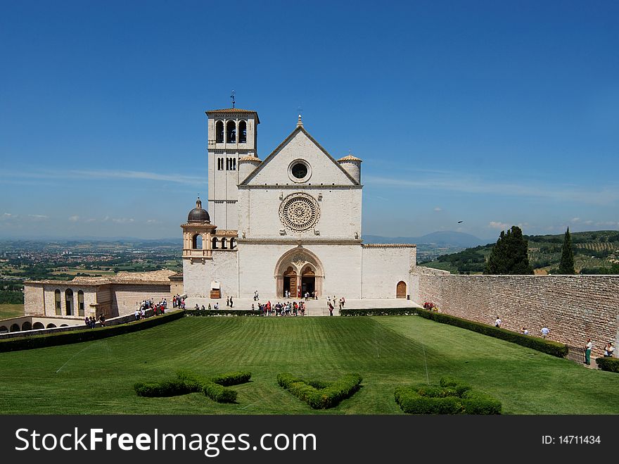 The basilica of Saint Francesco in Assisi, Italy, with the Franciscan PAX (peace). The basilica of Saint Francesco in Assisi, Italy, with the Franciscan PAX (peace)