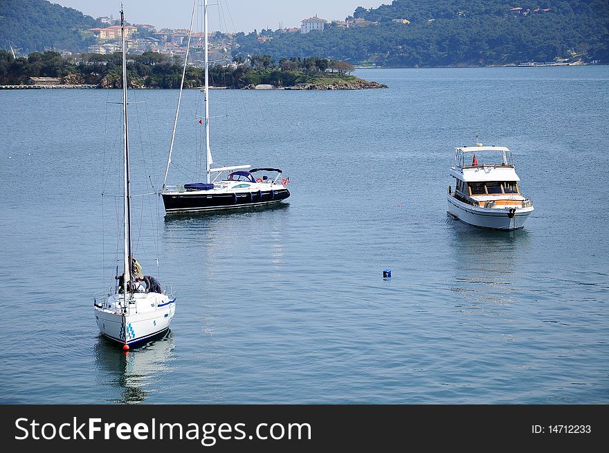 Three luxury boats traveling on sea . Three luxury boats traveling on sea