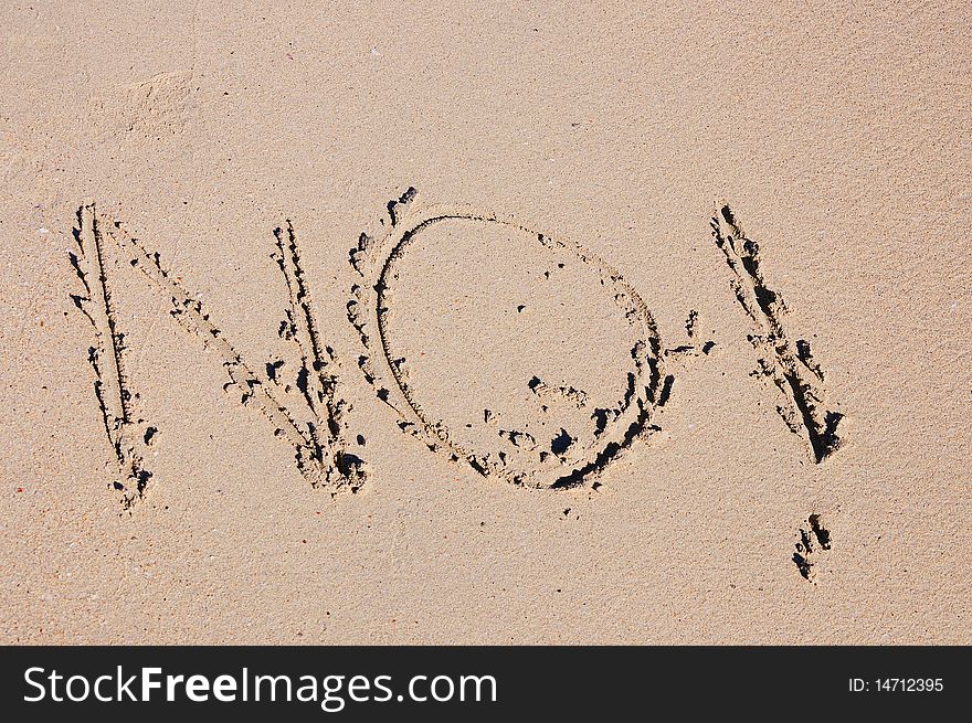 Word written on the golden sand at the beach. Word written on the golden sand at the beach