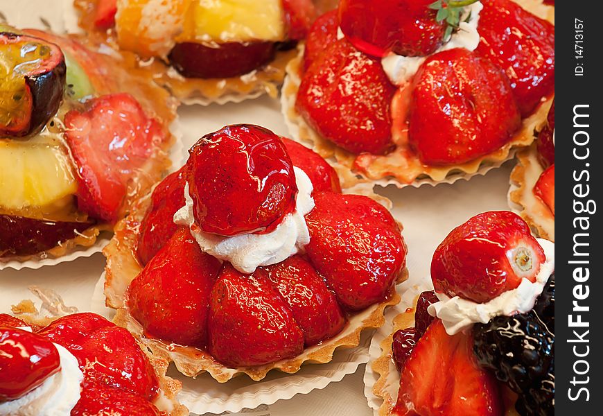 Fruit tarts on display in pastry shop. Fruit tarts on display in pastry shop