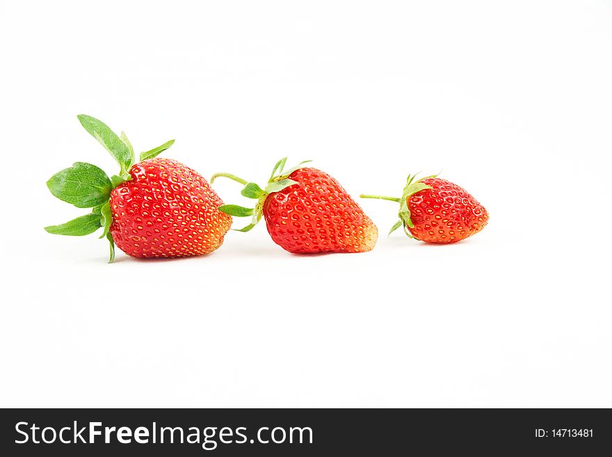 A three strawberry on white