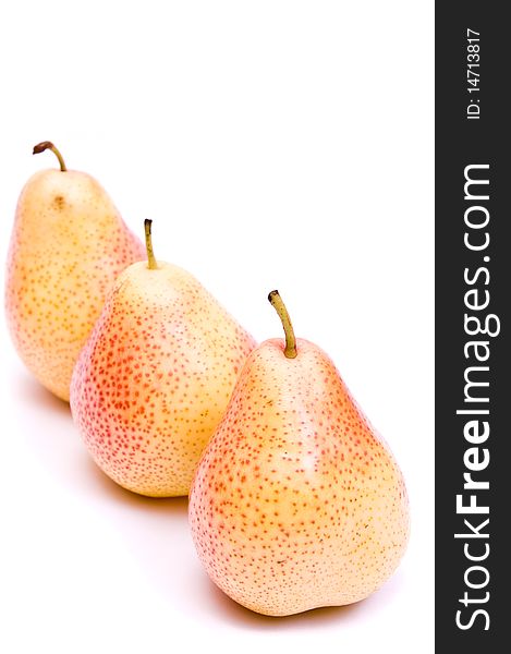 Ripe juicy pear on a white background