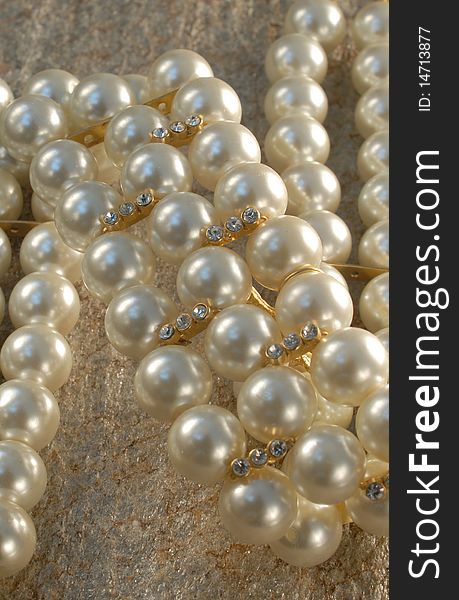 Beautiful shiny peary lecklace on the naturel stone. Beautiful shiny peary lecklace on the naturel stone