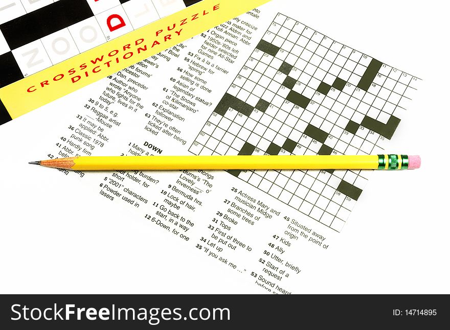 Crossword puzzle with crossword dictionary and pencil. Crossword puzzle with crossword dictionary and pencil