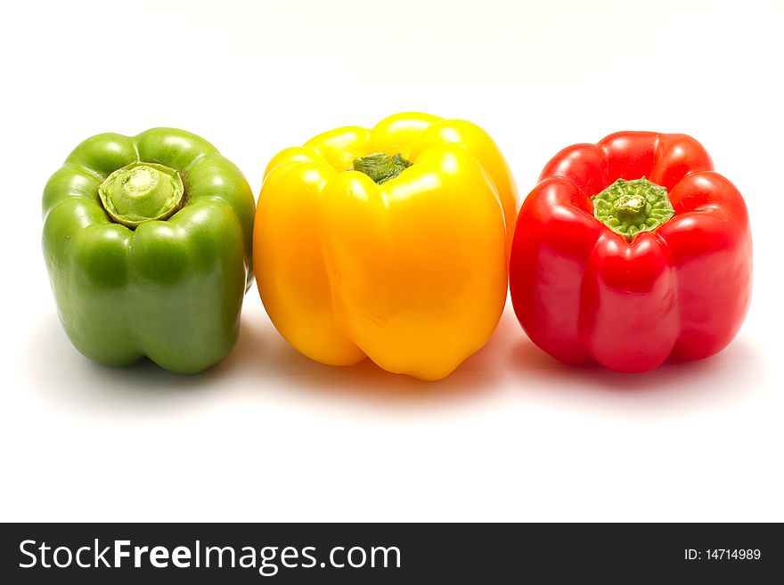 Green, Yellow and Red bell pepper isolated on a white background. Green, Yellow and Red bell pepper isolated on a white background