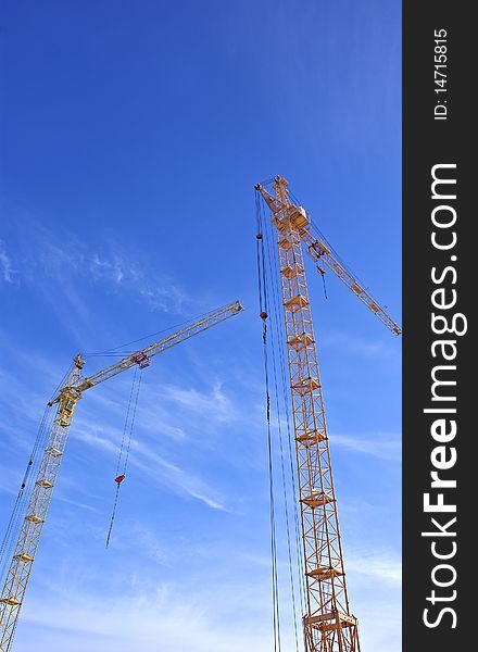 High-altitude tower crane necessary for elevation cargo and architectural construction  by erection new-built building