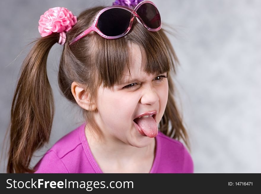 Portrait of young happy playful girl with glases. Portrait of young happy playful girl with glases