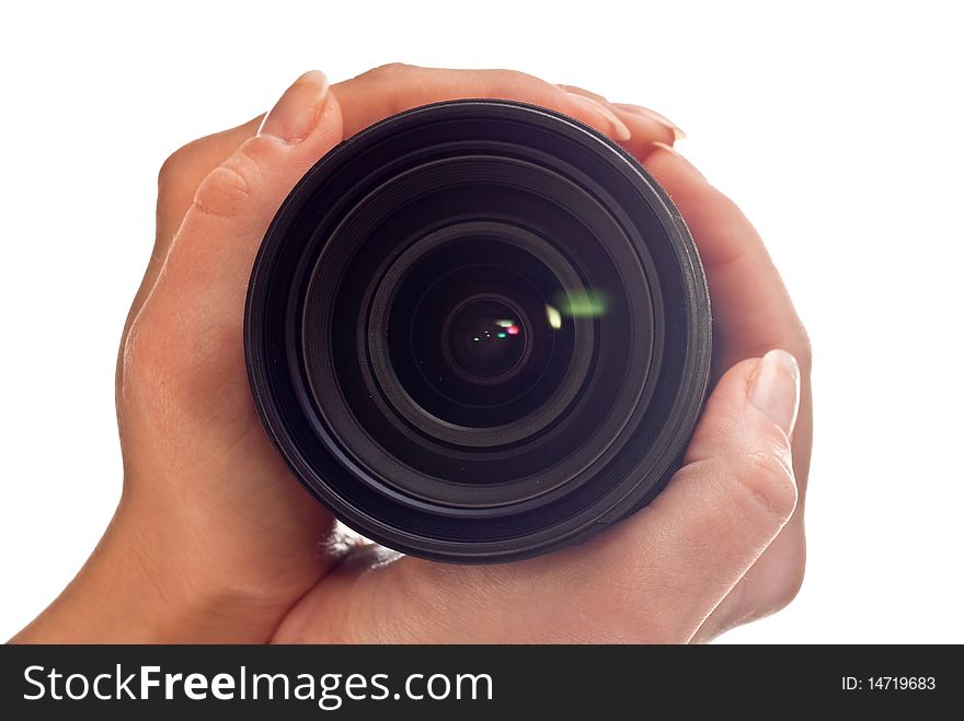 Photo lens in woman's hands. Isolated on white background. Photo lens in woman's hands. Isolated on white background