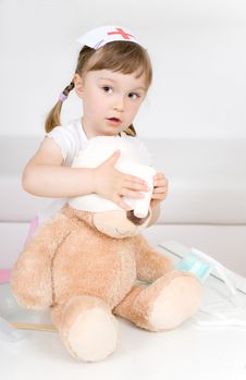 Little Girl Doctor With Teddy Bear Stock Image Little Girl Doctor With Teddy Bear Stock Image