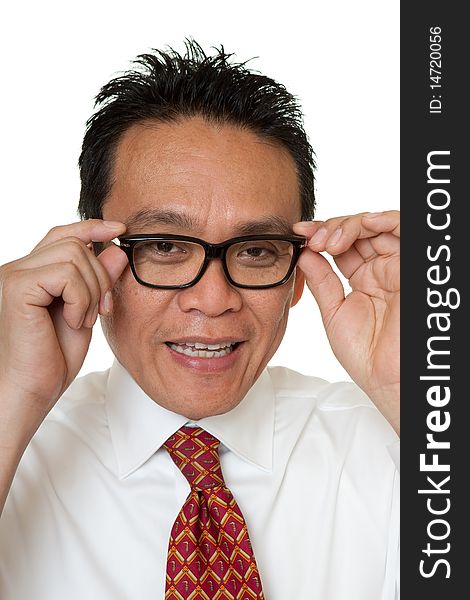 Businessman tests eyeglasses, portrait of an elegant man before white background