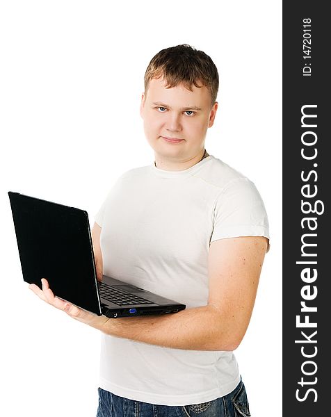 Young man in white t-shirt with laptop, isolated on white