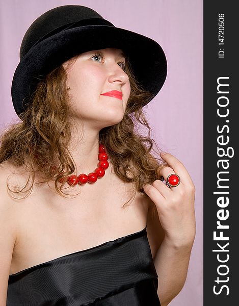 Portrait of attractive woman in hat