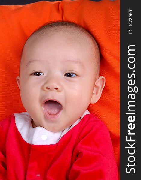 The Chinese infant baby laughing with great fun