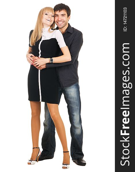 Beautiful young couple in casual clothing, white background