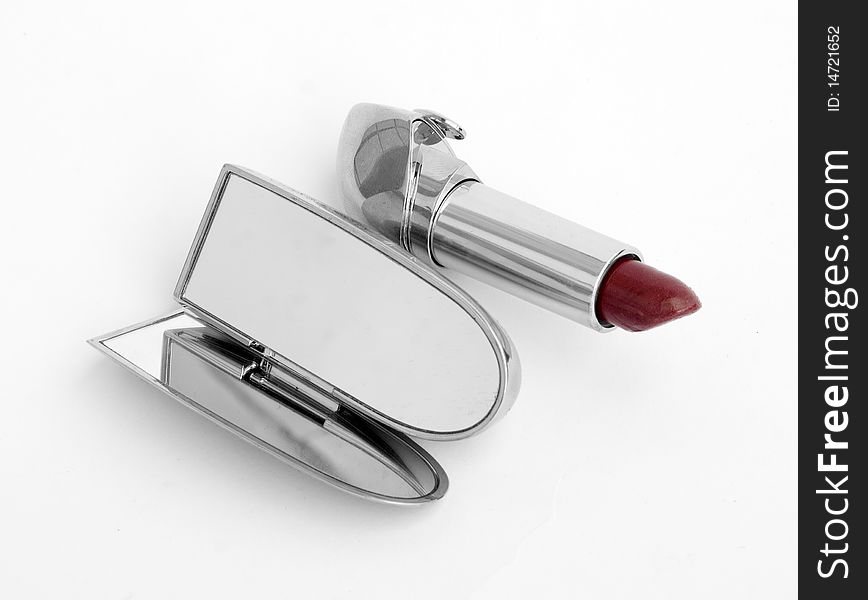 Female red lipstick on a white background. Female red lipstick on a white background