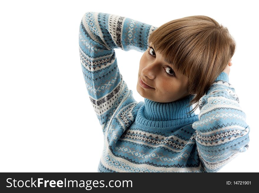 Portrait of the girl in blue sweater on white background