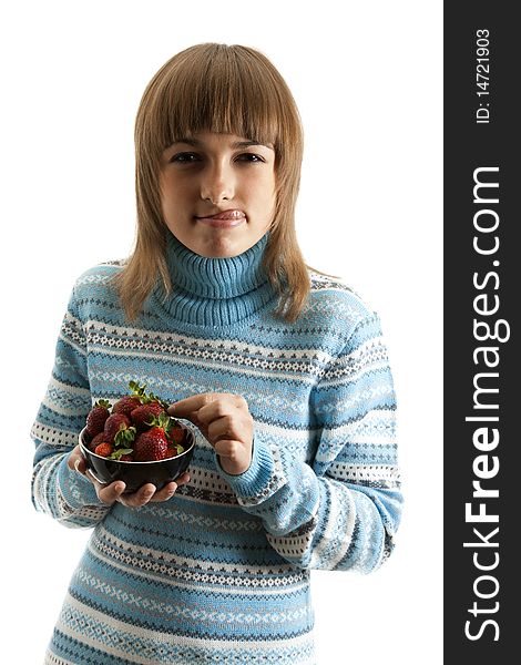 Portrait of the girl with plate of the strawberries in hand on white background