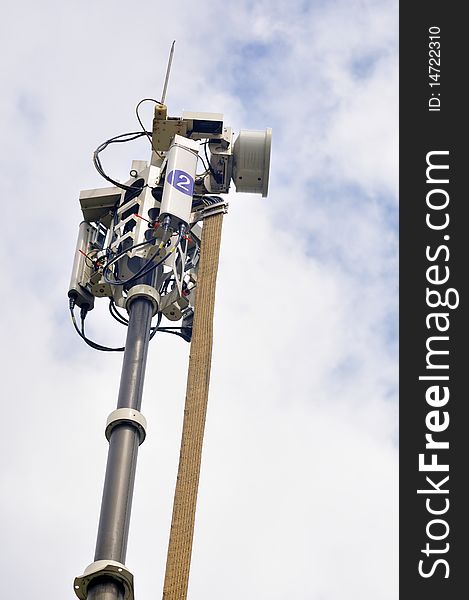 Lifting antenna on a truck, parking at a Meeting place for a large number of people