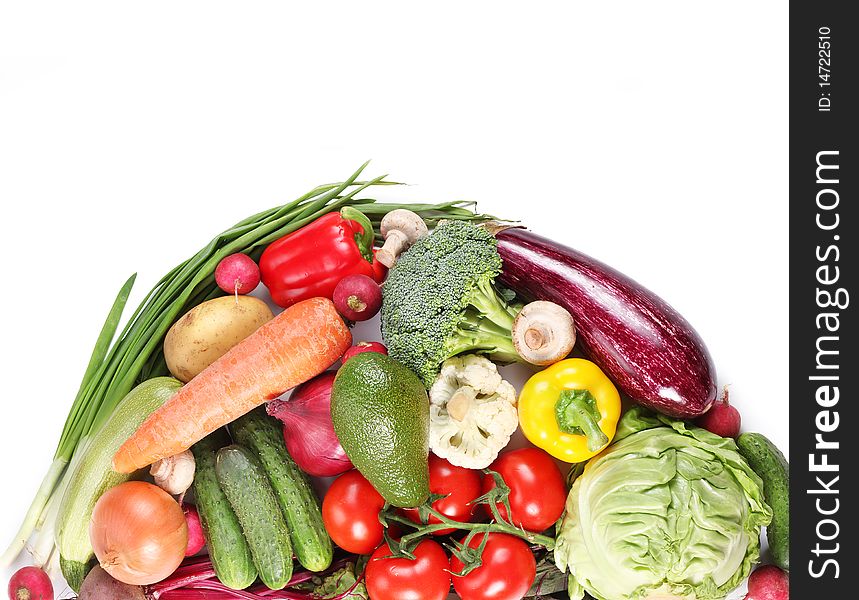 With vegetables in a semicircle. Isolated on white background