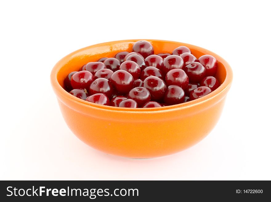 Sour cherry in a bowl isolated on white