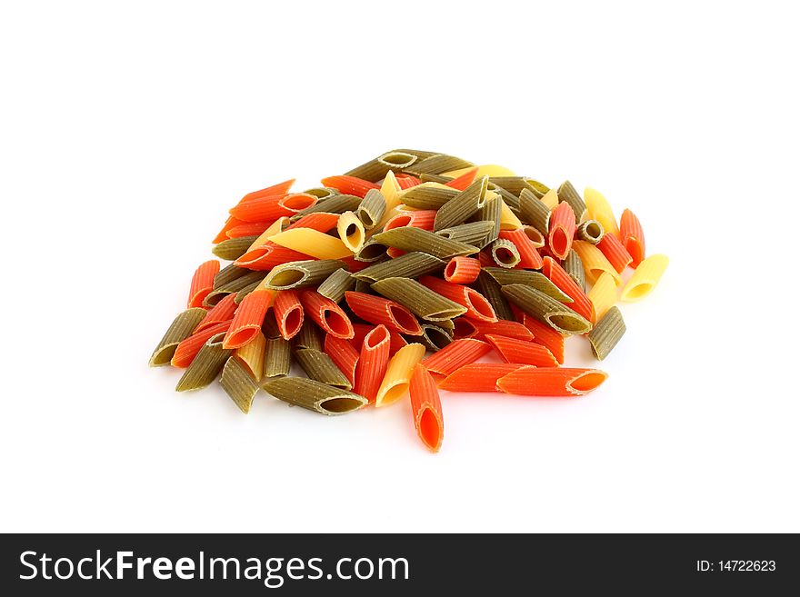 Raw colored pasta isolated on white background