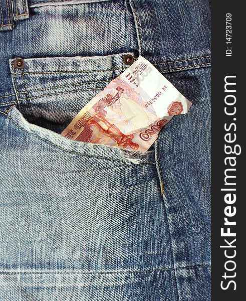 Money lies in pockets of jeans. Money lies in pockets of jeans