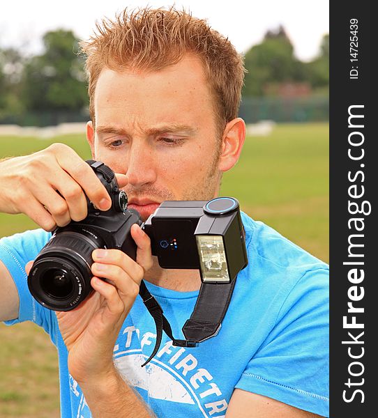 Young Man With Camera