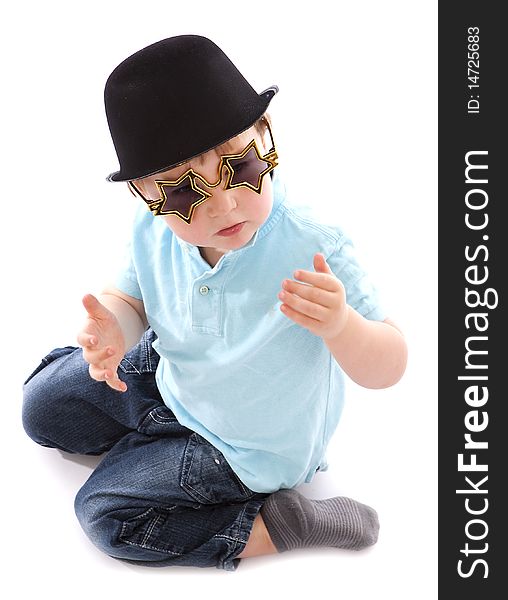 Young boy with bowler hat and novelty hat. Young boy with bowler hat and novelty hat