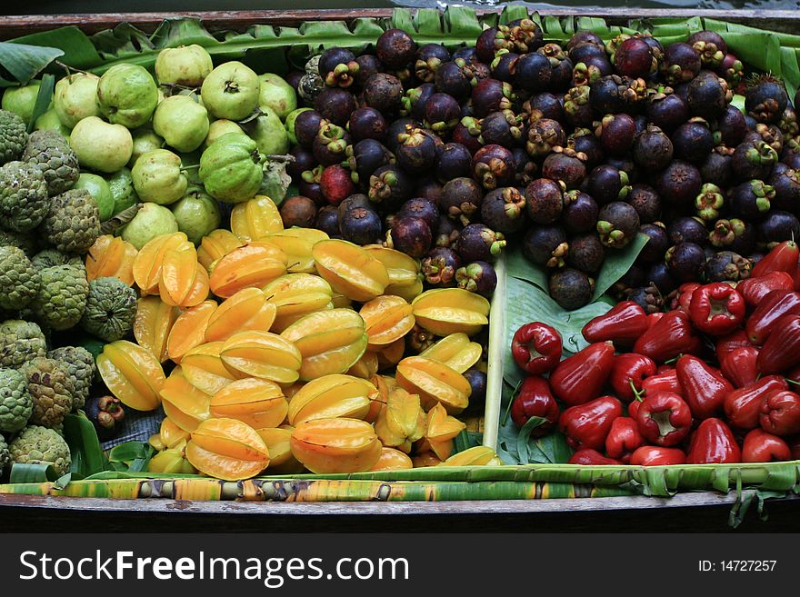 Fruit in Wooden Boats