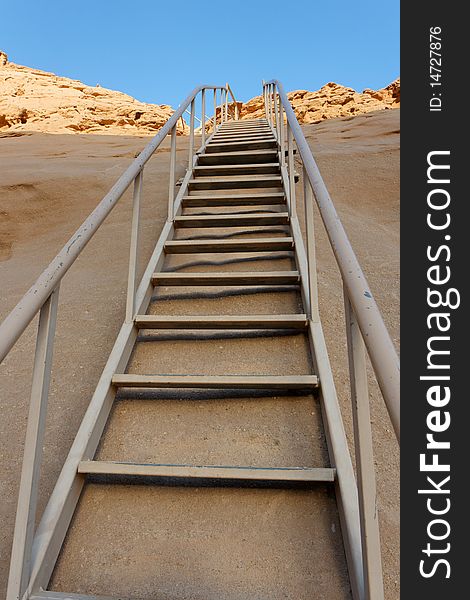 Staircase to yellow mountain in the desert outdoor. Staircase to yellow mountain in the desert outdoor