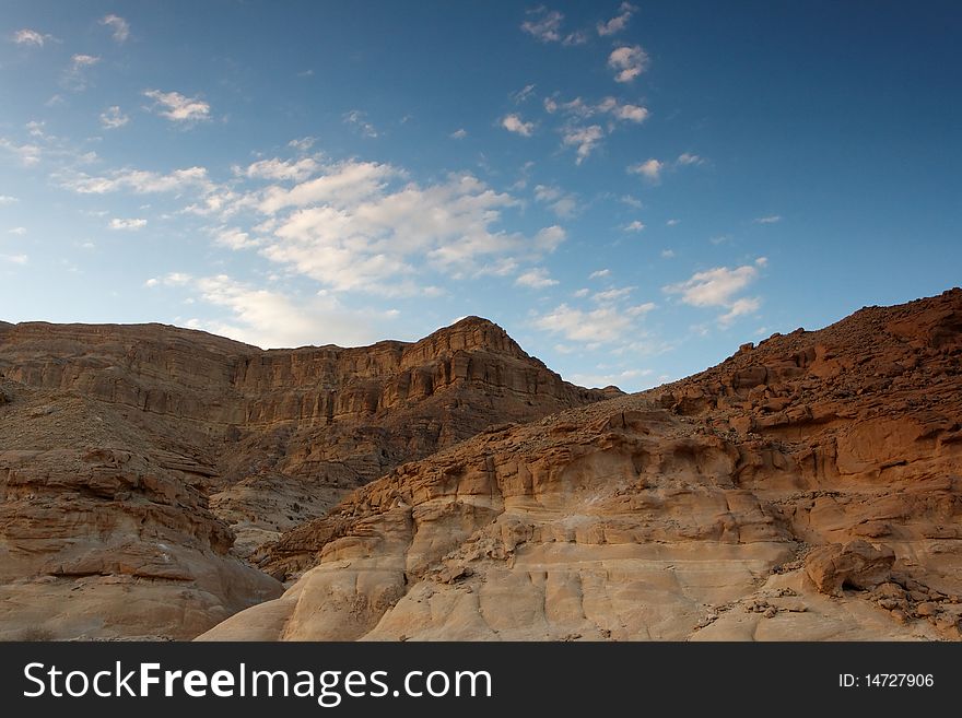 Rocky desert landscape at sunset