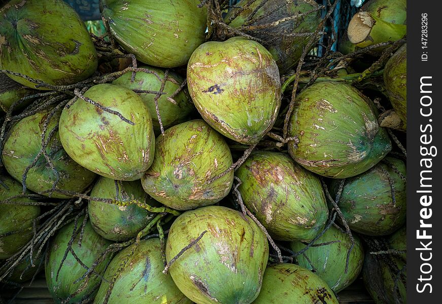 Fresh Green coconuts textured background
