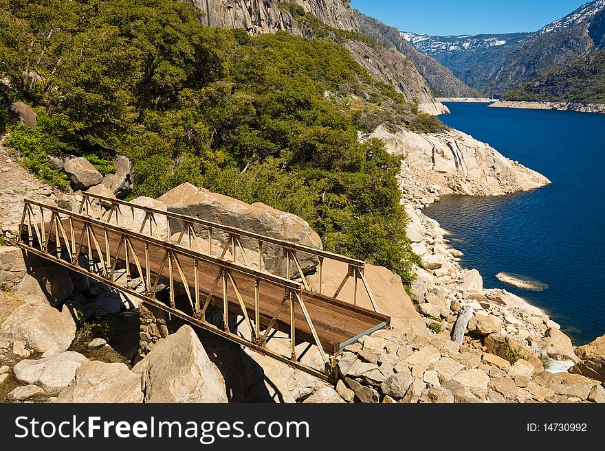 Wooden bridge at Hetch Hetchy reservoir in Yosemite National Park, California.