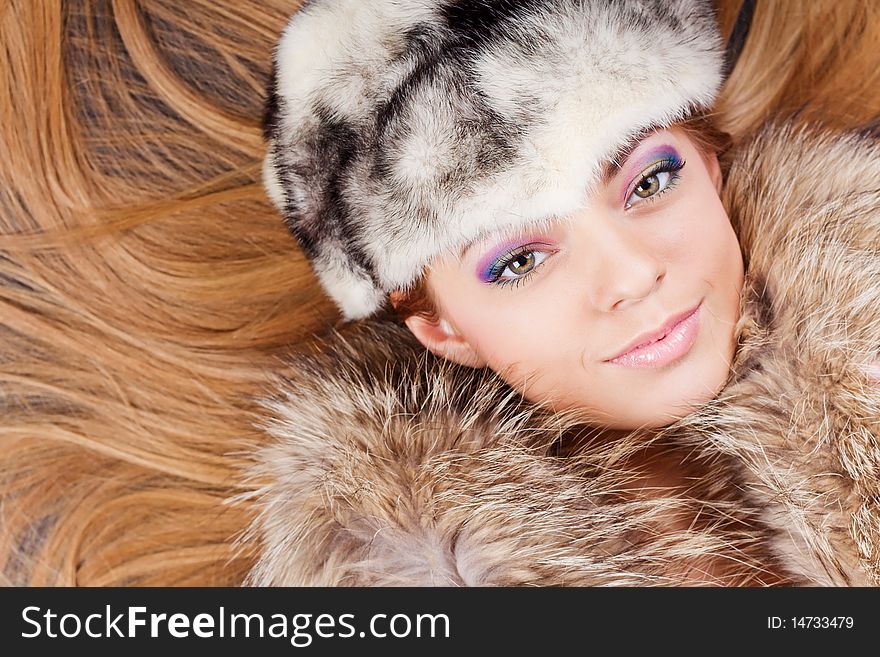 Young Pretty Girl In Fur Hat