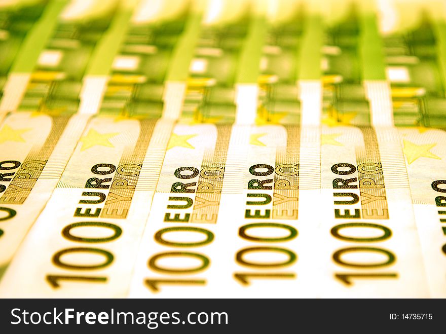 Many 100 Euro Banknotes standing in a raw. Many 100 Euro Banknotes standing in a raw