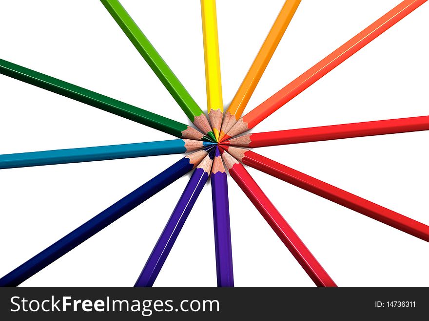 Color wheel performed from twelve coloured pencils on white background