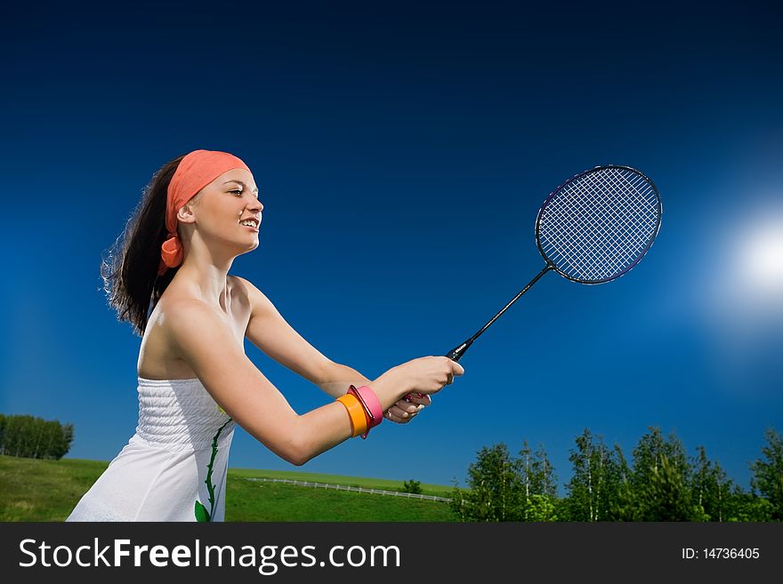 Beautiful girl in kerchief with racket. Beautiful girl in kerchief with racket