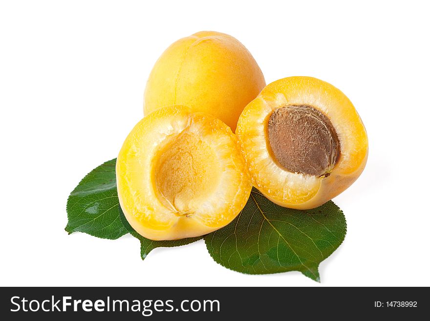 Fresh juicy apricots on white background