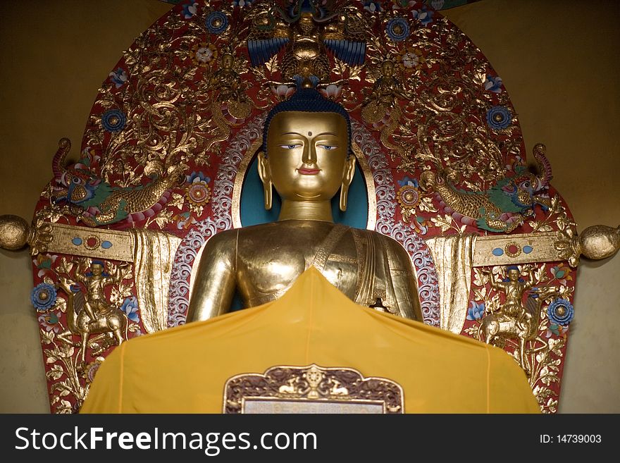 Buddha Statue in an ancient buddhist temple in the indian himalayas